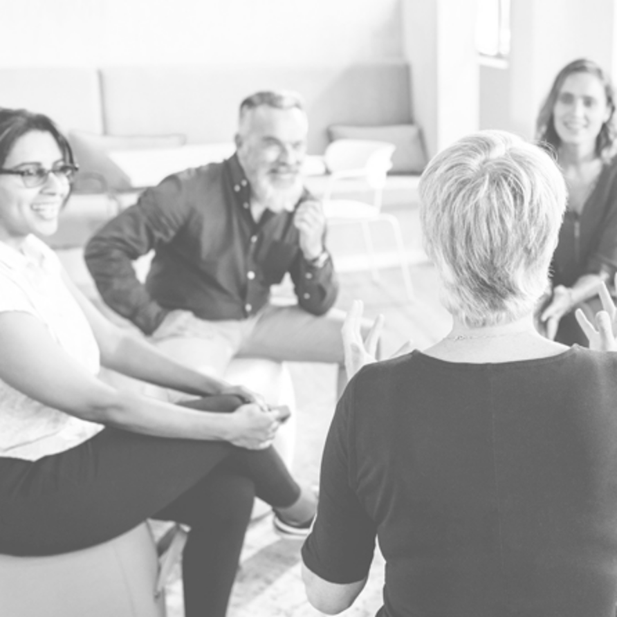 Fragrance oils team sat in a meeting